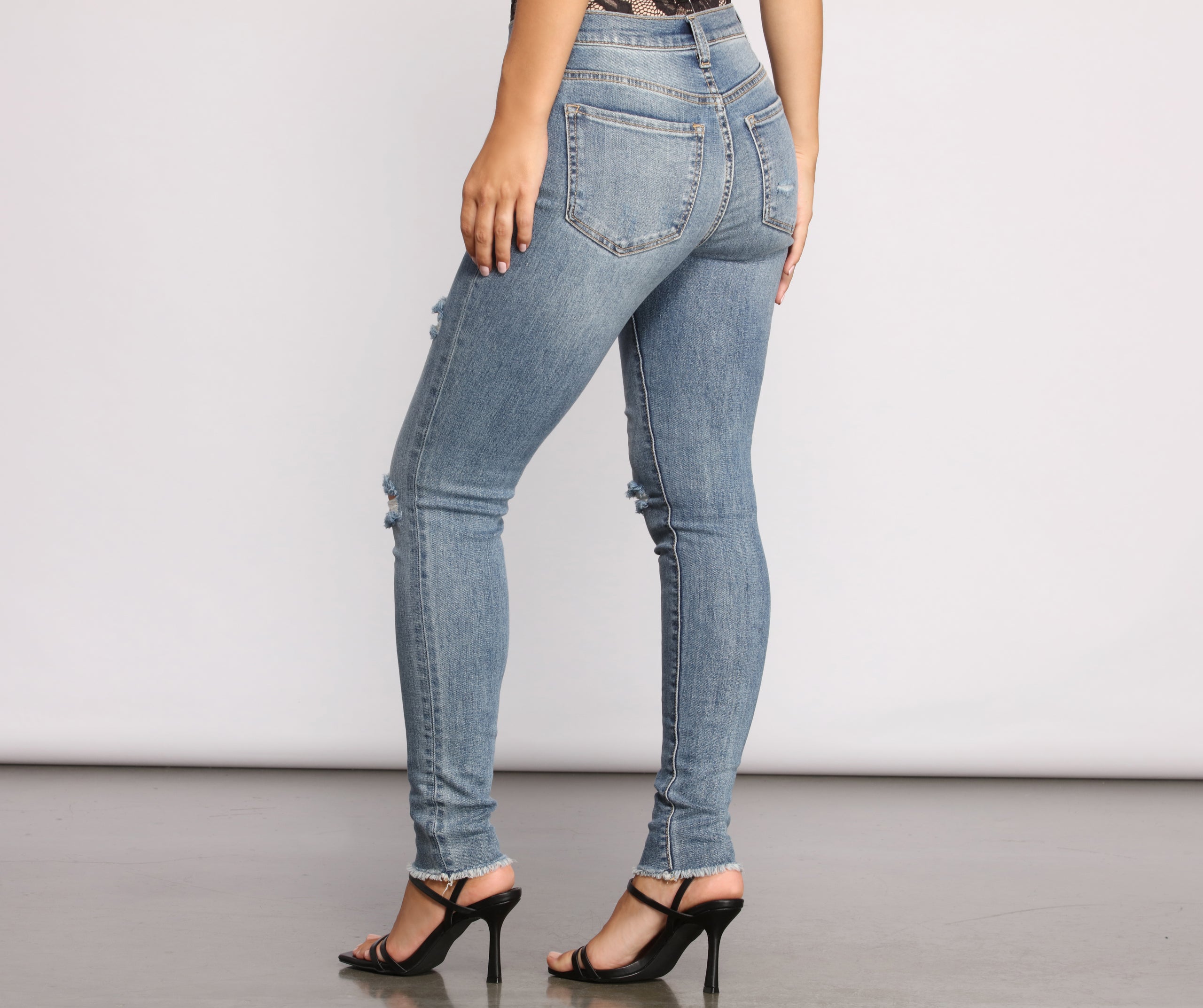 Taking Chances Destructed Raw Edge Skinny Jeans