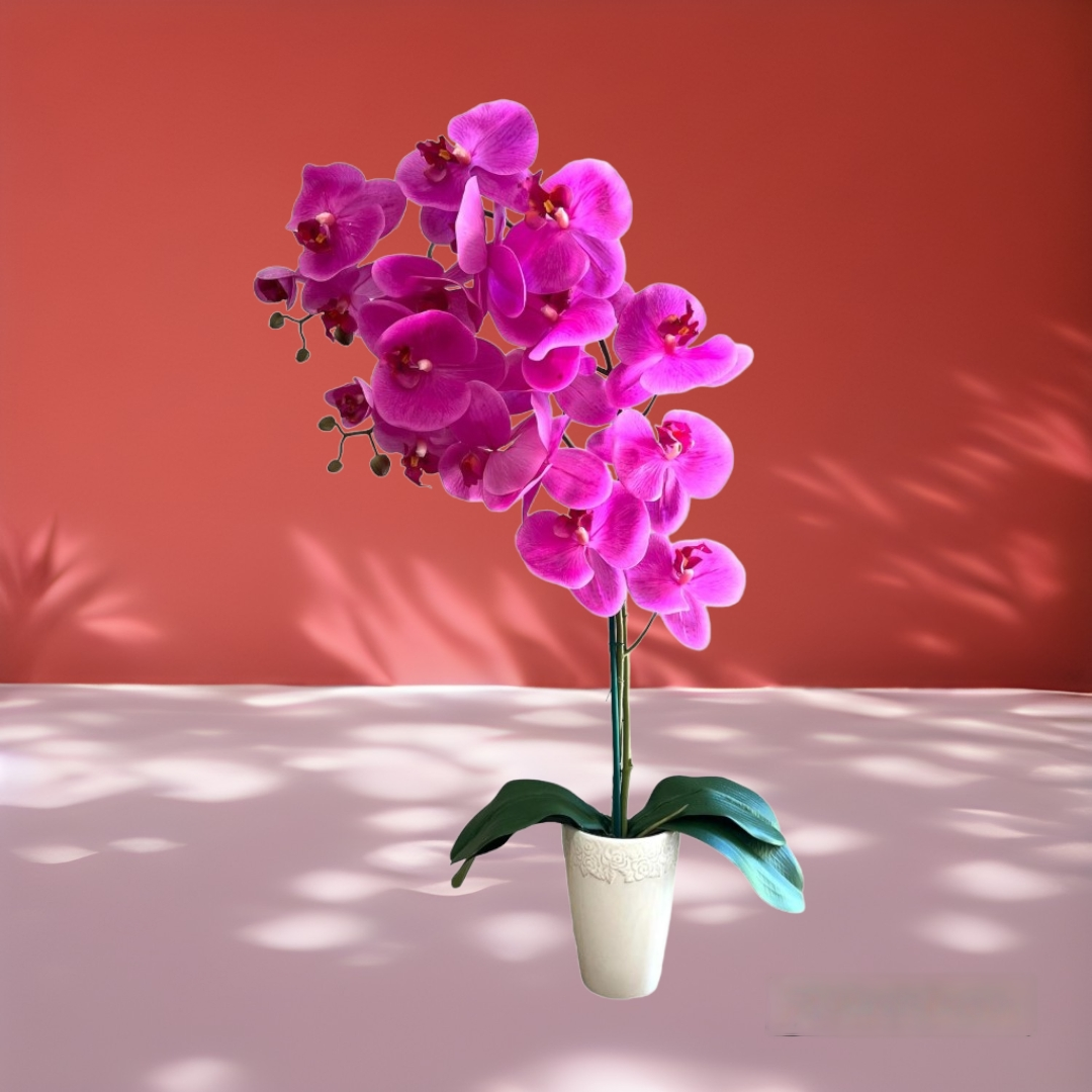 Gorgeous artificial orchid in a ceramic round pot