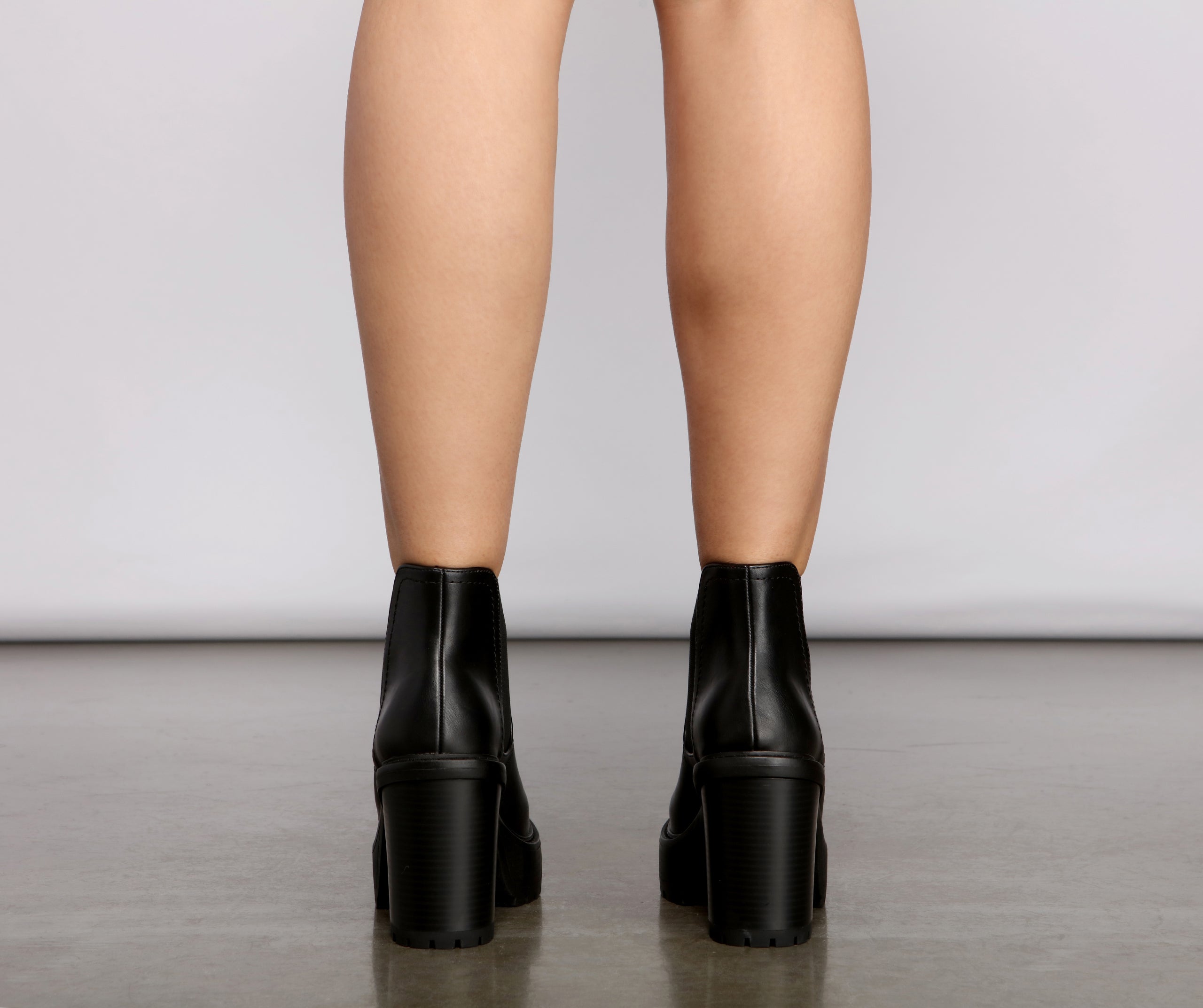 On the Edge Faux Leather Stacked Booties